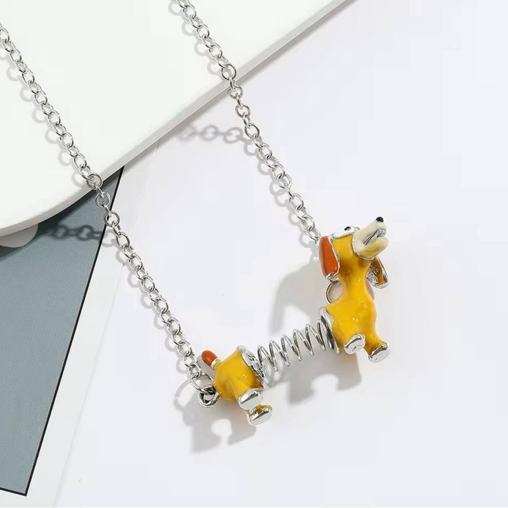 ⭐️NEW⭐️ Toy Story Slinky Dachshund Dog Pendant Necklace - Picture 4 of 8